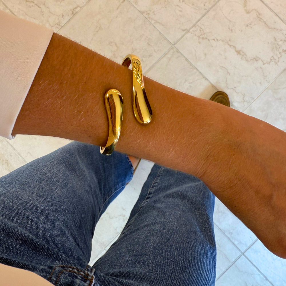 Bracciale Rigido Connessione Dorata in Acciaio Gold