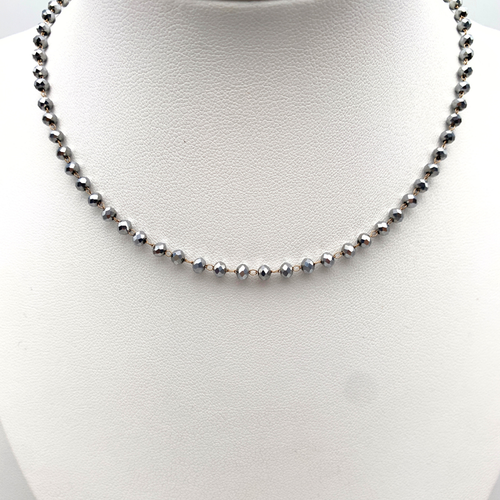 collana girocollo in acciaio gold con perline sfaccettate in ematite