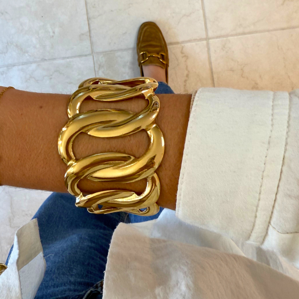 Bracciale Rigido Intrecciato in Acciaio Oro Lucido