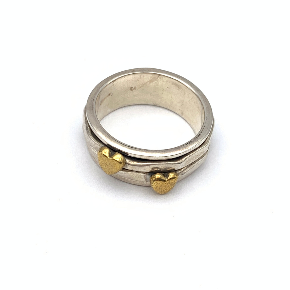anello in argento 925 composto da due anelli con cuore gold saldato scorrevoli su un anello più grande