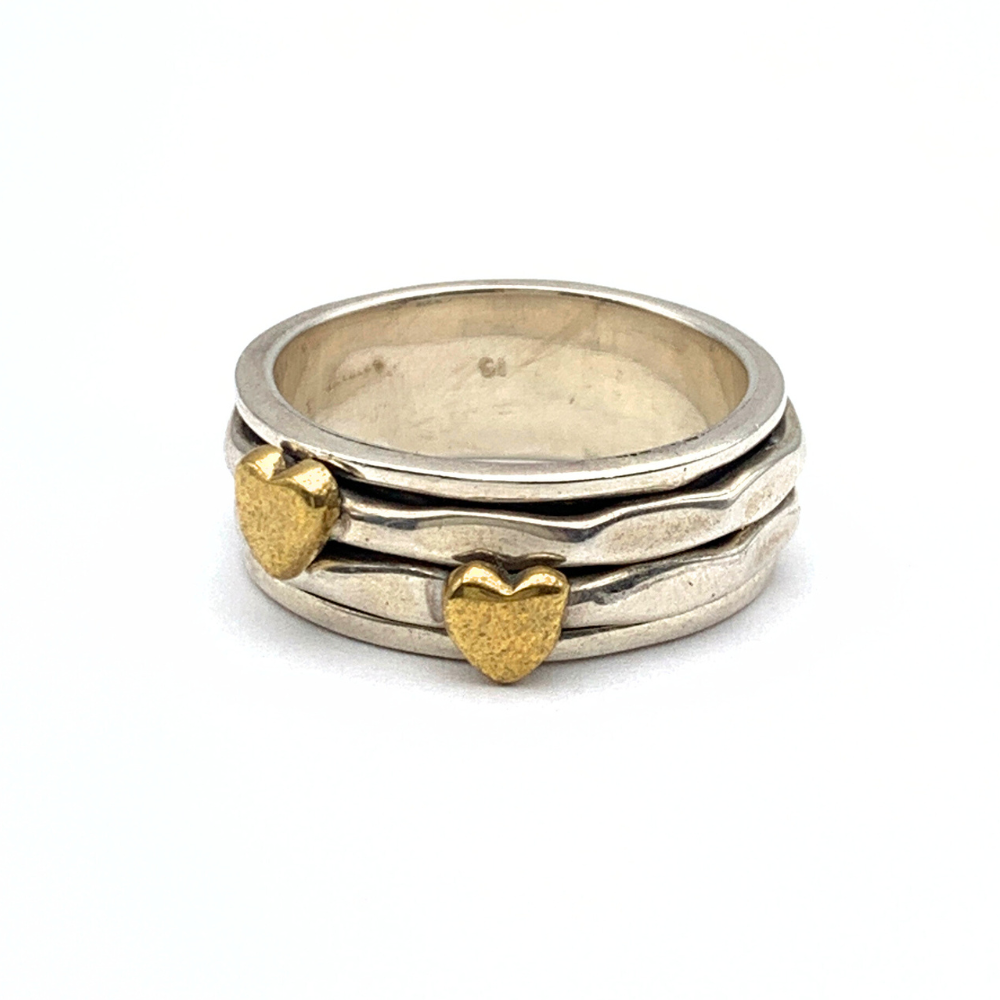 anello in argento 925 composto da due anelli con cuore gold saldato scorrevoli su un anello più grande