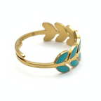 anello in acciaio gold papillon con foglie smaltate celesti