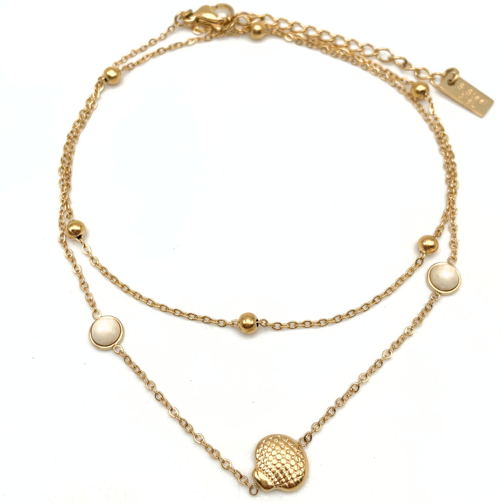 bracciale in acciaio gold doppio con pietre bianche e conchiglia
