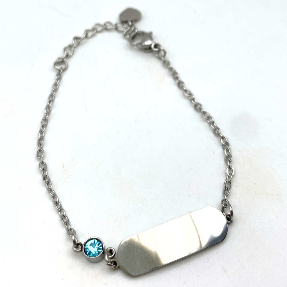 bracciale in acciaio silver con targhetta e zircone azzurro