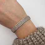 bracciale in acciaio gold con zirconi bianchi quattro file