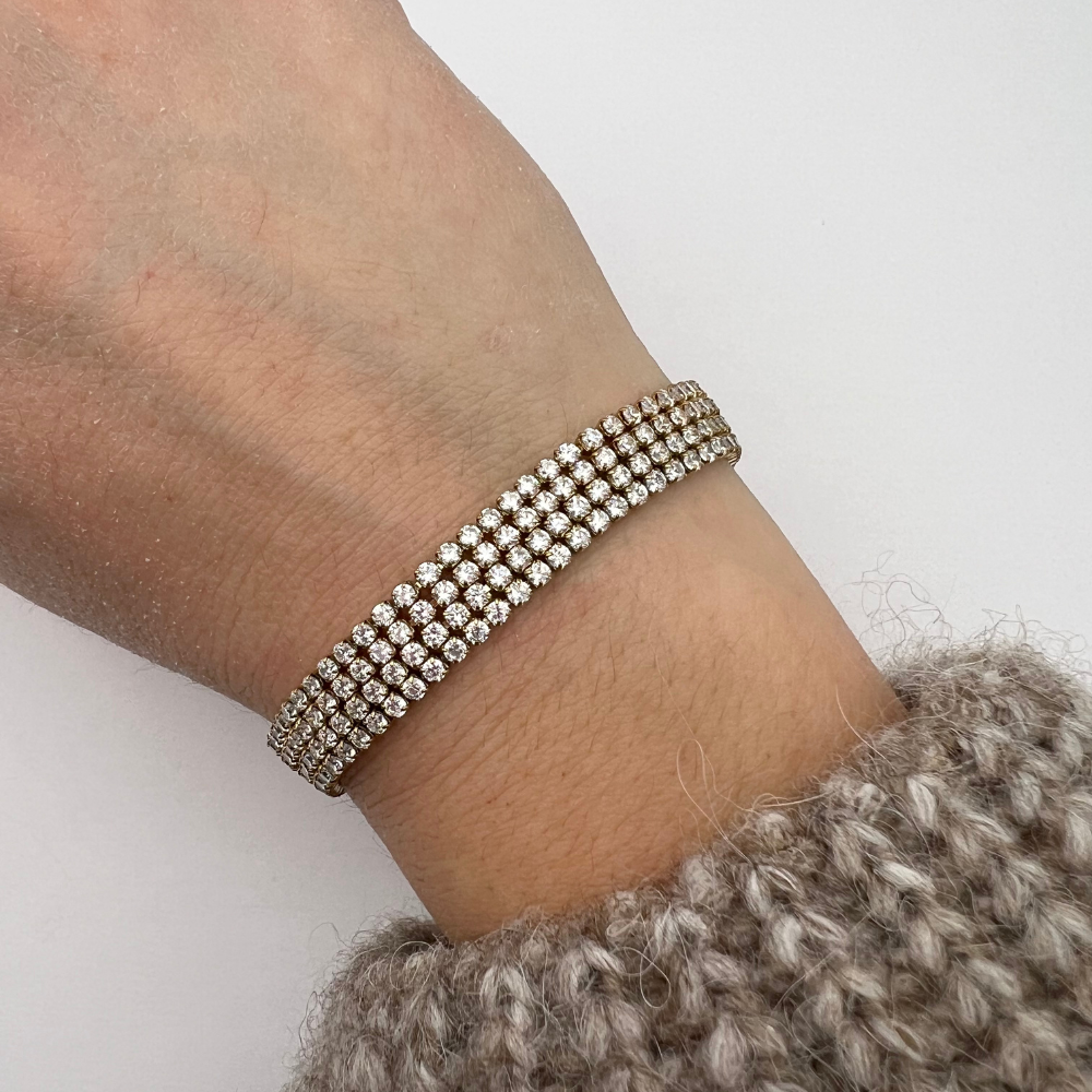 bracciale in acciaio gold con zirconi bianchi quattro file