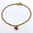 bracciale in acciaio gold torchon con ciondolo corallo