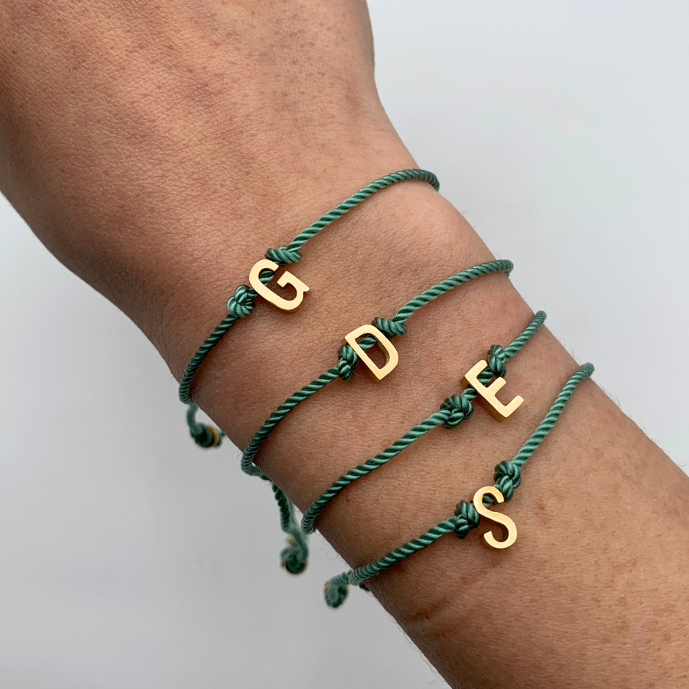bracciale con cordino Tiffany torchon con chiusura scorrevole e lettera personalizzata in acciaio gold