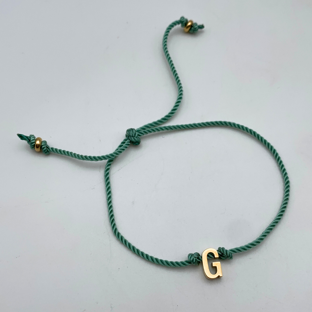 bracciale con cordino Tiffany torchon con chiusura scorrevole e lettera personalizzata in acciaio gold