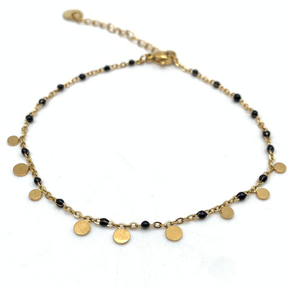 cavigliera in acciaio gold con medagliette pendenti e perline smaltate nere