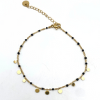 cavigliera in acciaio gold con medagliette pendenti e perline smaltate nere