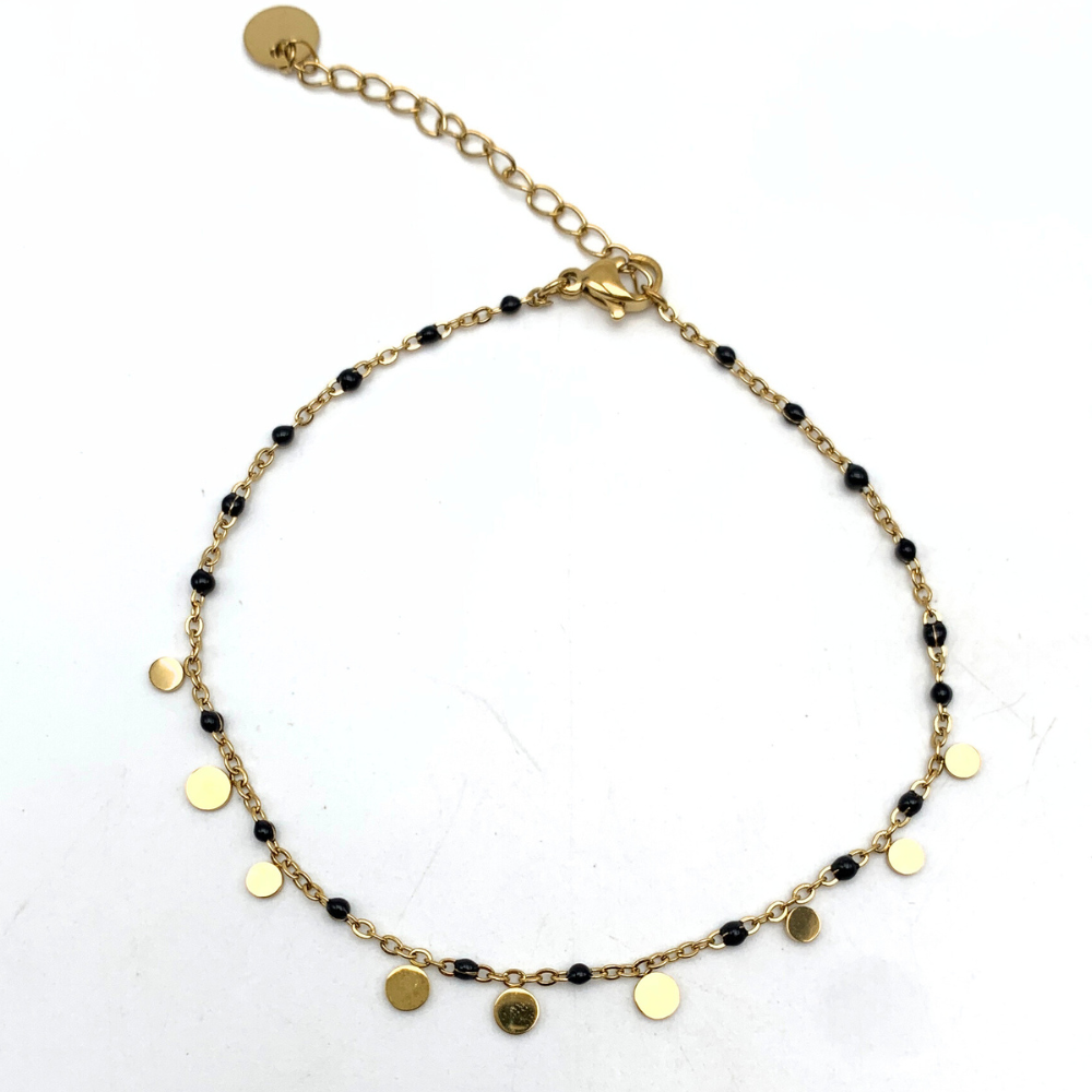 cavigliera in acciaio gold con medagliette pendenti e perline smaltate nere