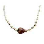 Collana Alma con Perle di Fiume e Cuore Mocha in Acciaio Gold