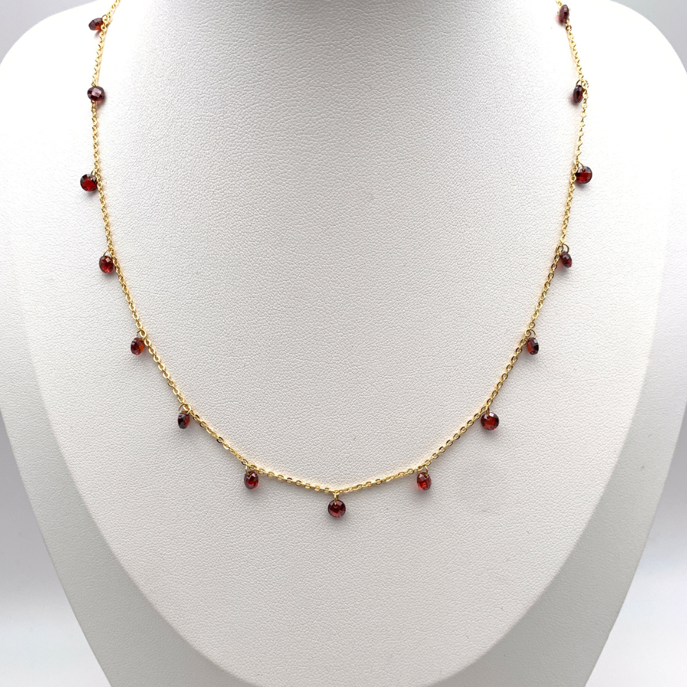 collana in acciaio gold con perline a ciondolo rosso rubino
