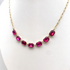 collana in acciaio gold con zirconi fucsia