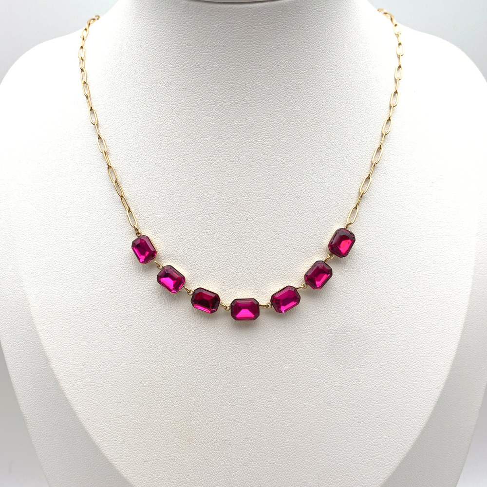 collana in acciaio gold con zirconi fucsia