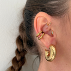 Orecchini a Cerchio Bombato Lisci in Acciaio Gold