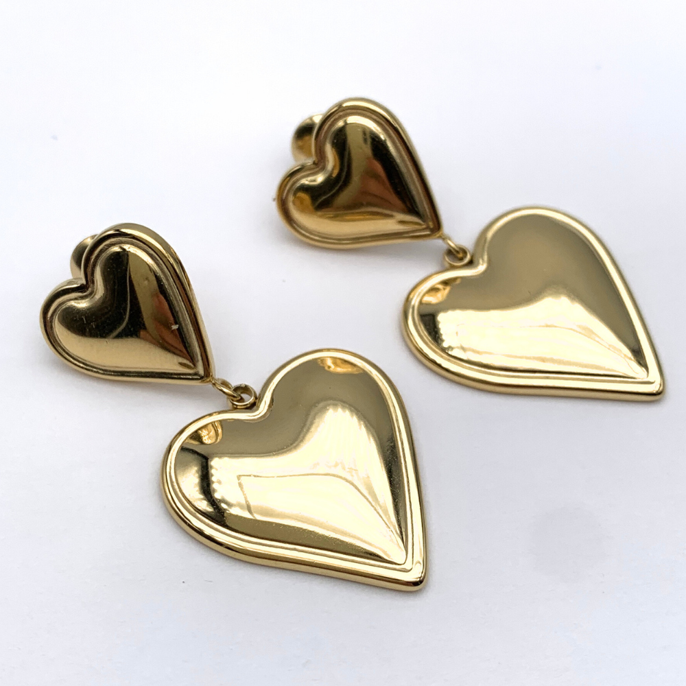 orecchini due cuori pendente in acciaio gold