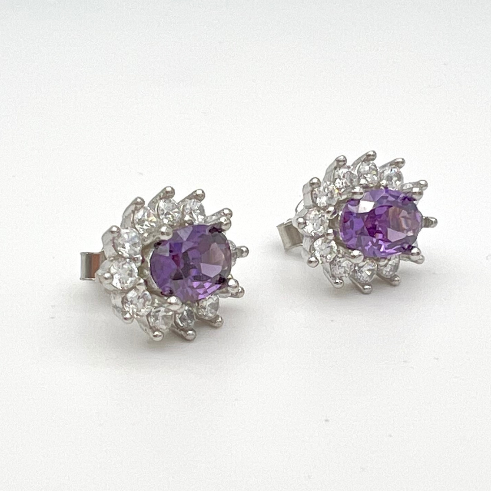 orecchini in argento 925 con zirconi bianchi e zircone viola centrale