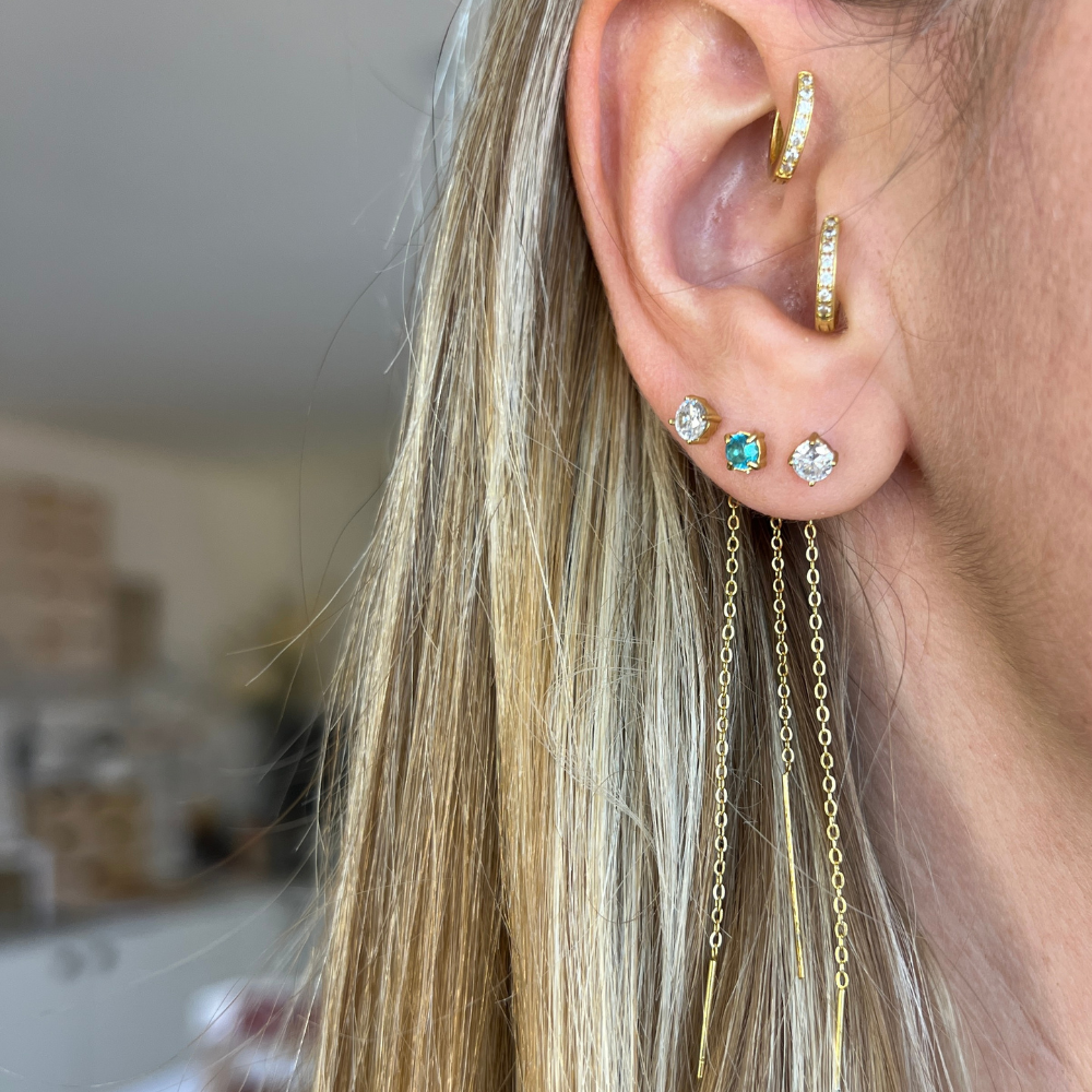 saliscendi zirconi in acciaio gold set