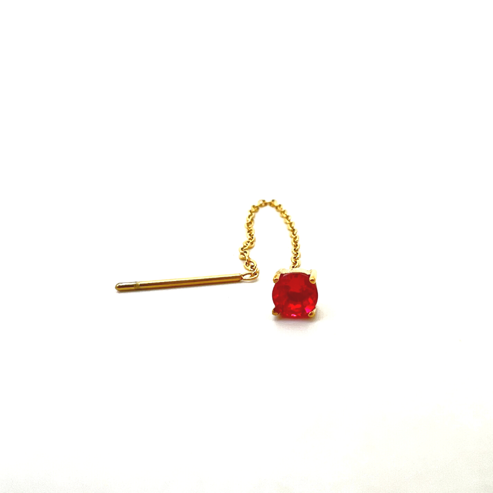 mono orecchino saliscendi in acciaio gold con zircone rosso rubino