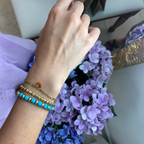 bracciale con ciondolo corallo, bracciale rondelle martellate e bracciale pietre azzurre e rondelle